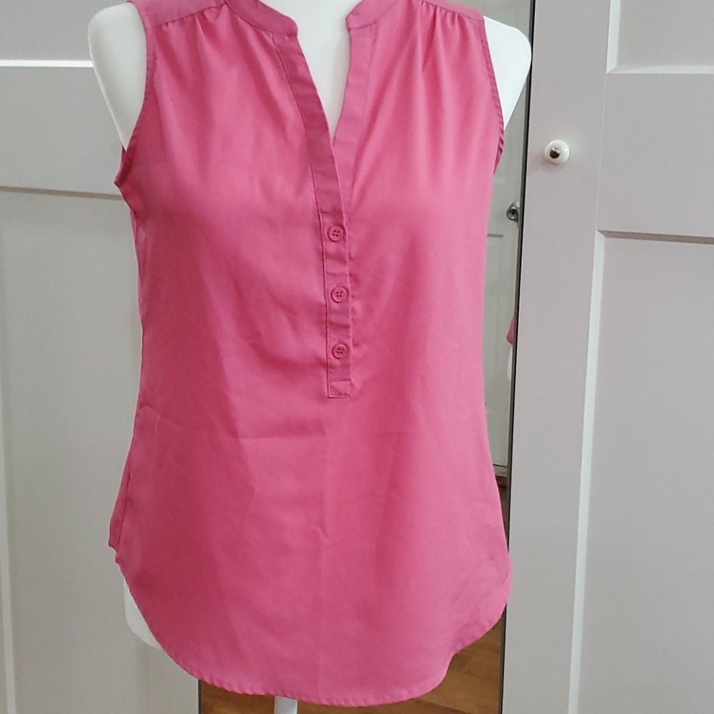 Pink sleeveless blouse
